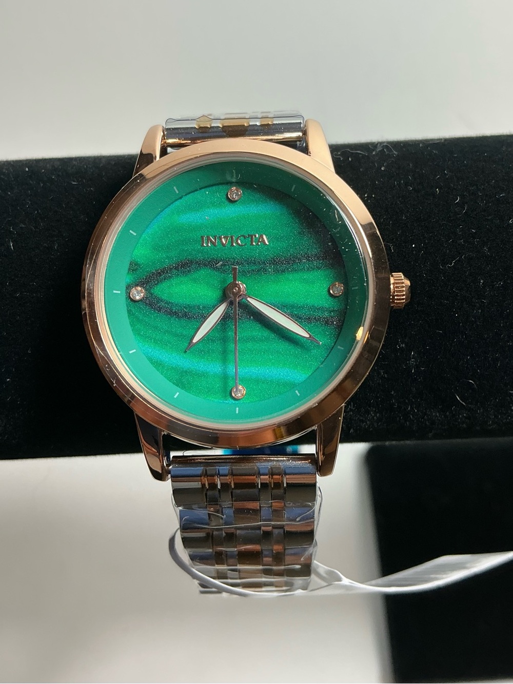 Invicta woman’s Rose Gold Case Watch with Green Dial and Silver Bracelet(69298)